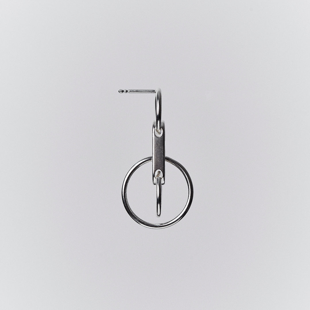 The size view of a silver earring with interconnected hanging rings.