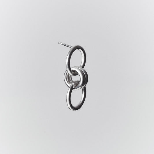 bold silver earring with a double ring loop.