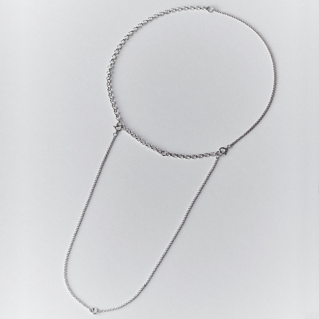 An adjustable silver necklace with a double layered chain.