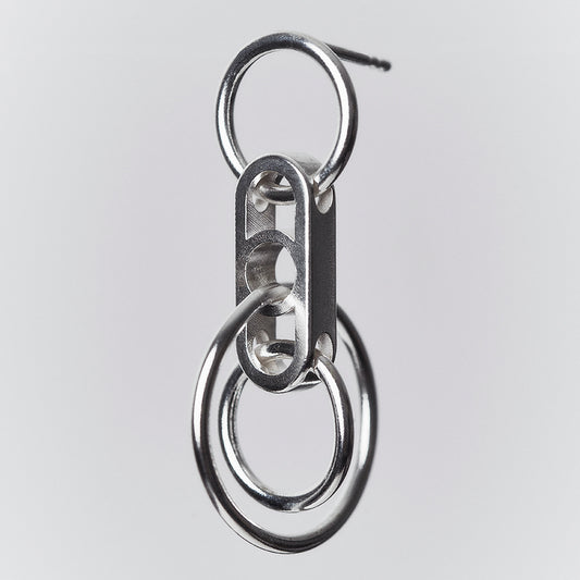 A silver earring with interconnected hanging rings.
